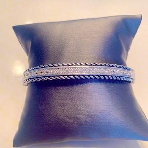 Sterling Silver Pave’ Cubic Zirconium Oval Bangle With Safety Latch 7inches